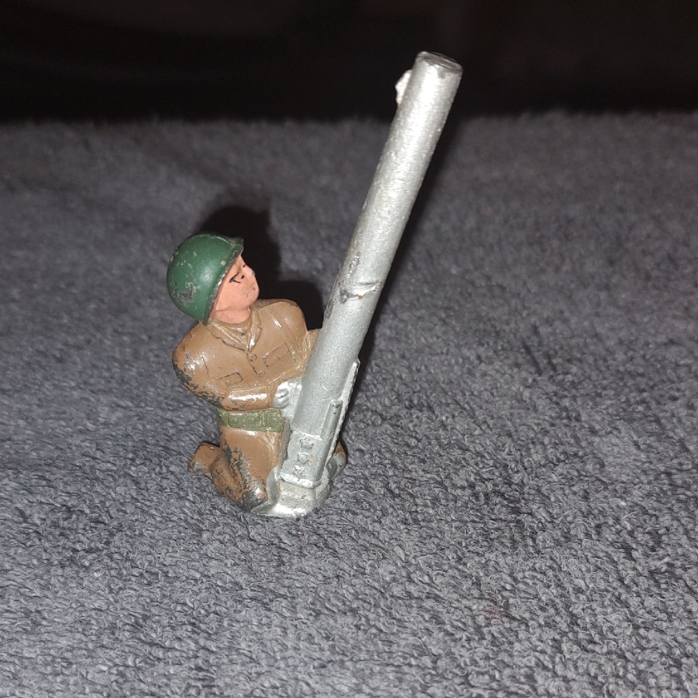 Vintage Soldier Figurine with Cannon